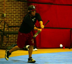 In preparation for the spring season, Jake Ehrenberg '10 practices bunting in the PEC with the rest of the baseball team on Wednesday. - Michelle Fournier