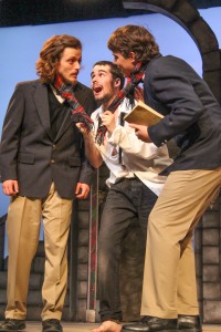 Matt Steege ’17 (center) hamming up the stage with Charlie Eddy ’16 (left) and Hutch Freeland ’14 (right). Photo by Sarah Trop.