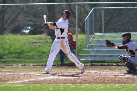 Teague Towner ’16 bats against Coe College on Tuesday, April 15. Photo by Aaron Juarez. 