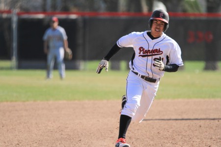 Niko Takayesu ’17 runs the bases against Coe College on Tuesday, April 15. Photo by Aaron Juarez. 