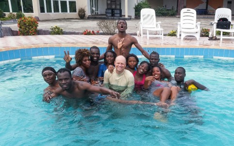 Tim Hammond enjoys a swimming session with his students in Ghana. Photo contributed. 