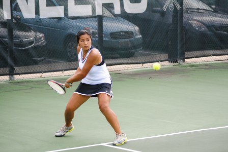 Shirlene Luk ’15 hits a forehand against Augustana College on Thursday, Aug. 28. Photo by Connie Lee