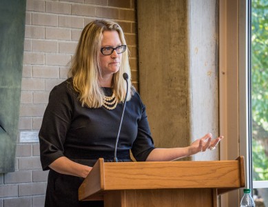 Professor Astrid Henry, GWSS, reads from her new book “Feminism Unfinished” in Burling Library. Photo by Jun Taek Lee.