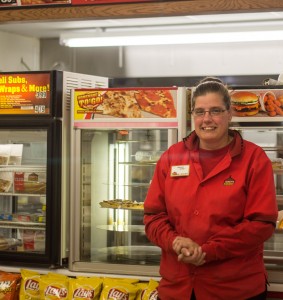 Stephanie Dillon, the manager at a Casey’s General Store, poses for a photo at work. Photo by Ying Long. 