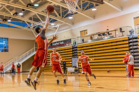 Mike Porter ’17 makes a layup during practice. Photo by Chris Lee. 