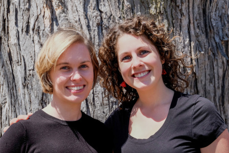 Last year’s winners, Ana Novak (left) and Tayler Chicoine (right) pose for a photo.