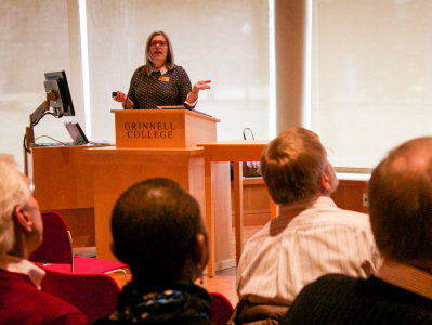 Kate Walker highlighted some achievements and challenges associated with Grinnell’s endowment. Photo by Sarah Ruiz.