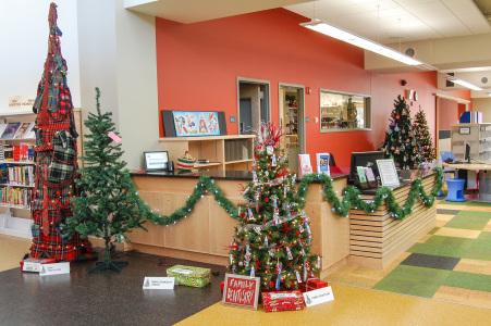 Drake Community Library will be decorated with a multitude of themed Christmas trees. 