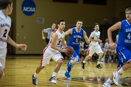 Dylan Bartuch ’15 drives down the court versus Illinois College on Tuesday. Photo Credit John Brady 