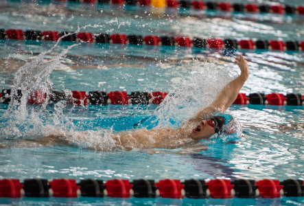 Alex Lundy ’16 practices his backstroke in practice last semester. Photo by John Brady