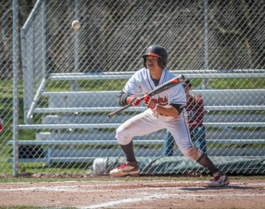 Niko Takayesu ’17 bunting in Thursday’s game.  Photo by Chris Lee