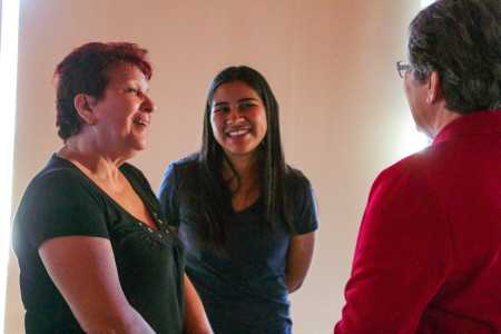 Carmen Chavez speaks through her translator on Wednesday in JRC 101. Photo by Sarah Ruiz.