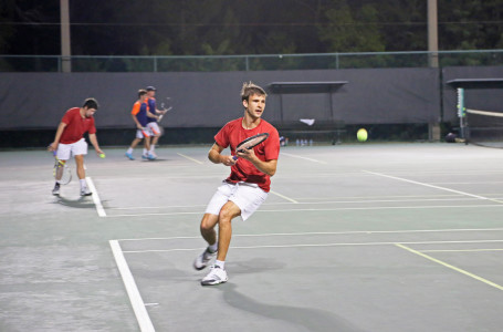Elliott Czarnecki ’15 hiting a forehand versus Hope College in a match Grinnell won 9-0.  Photo contributed. 