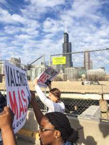 Taylor Burton ’18 and Cecilia Kwakye ’17 participate in a march for workers’ rights in Chicago. Photo contributed
