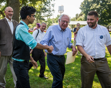 Senator Sanders greeted Dhruv Gupta ’17 after his speech in Central Park last Thursday, September 3. Photo by John Brady. 