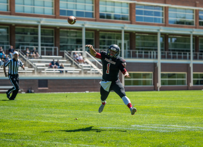 Quarterback Sam Poulos ’16  made 20-of-28 passes for 262 yards.  Photo by John Brady