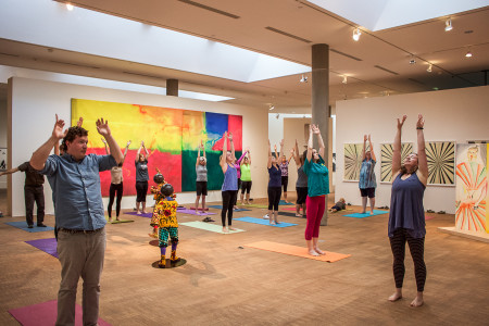 Monica St. Angelo (far right) leading the yoga sessions at Faulconer Gallery. (Photo by Minh Tran)