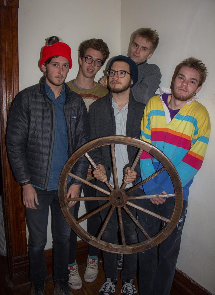 Clockwise from top left: Cal Froikin, Ezra Edgerton, Jack Dunnington, Mark Spero and Nick Matesanz, all ’16,  pose behind one of the curious objects in Bean World. Photo by Sarah Ruiz.