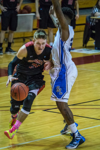 Braedon Bayer ’18 charging past Silver Lake last Saturday.  Photo by Takahiro Omura