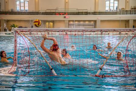 Zach Laird ’17 making a save for the Wild Turkeys, Grinnell’s water polo club team, that is among the best in the nation.  Photo by Jun Taek Lee