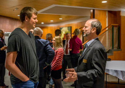 Alex Mitchell ’17 and Michael Kahn ’74 mingle amongst students and trustees at a meet and greet on Thursday.  