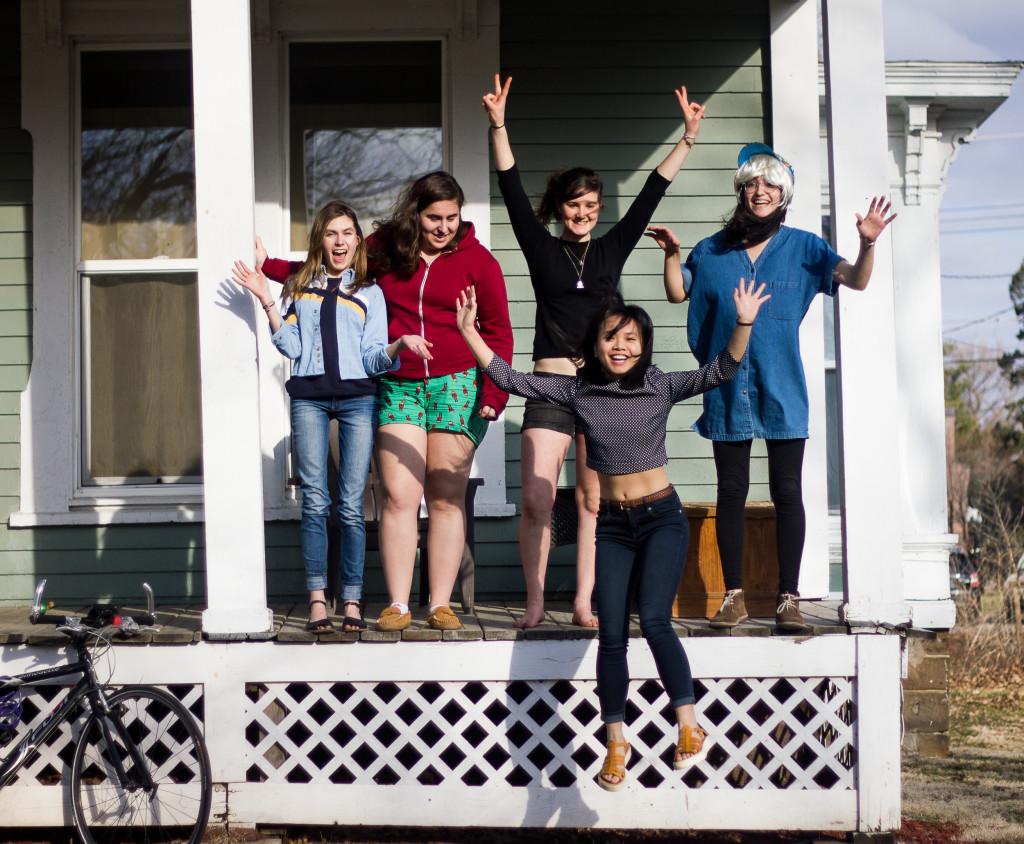 From left to right: Elizabeth Allen, Claire Graebner, Amelia Greenberg, Yishi Liang and Phoebe Mogharei, all 16, celebrate the arrival of spring on their porch at 1132 Broad St. Photo by Hung Vuong