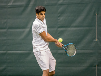 Caleb Kumar ’16, in action two weekends ago versus Central College, has been an integral part of the tennis team’s split-squad success.  Photo by John Brady