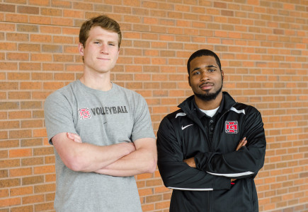 Tracy Johnson ’16 and Jermaine Marks ’17 rep for the teams they manage: volleyball and basketball, respectively. Photo by Ellen Schoenmaker