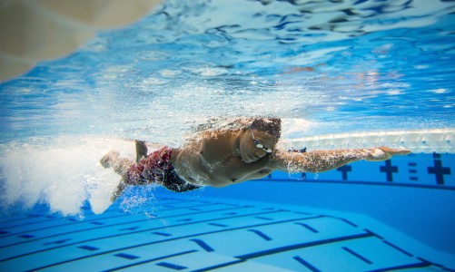 Joshua Tibatemwa a first-year student at Grinnell College trains in the Russell K. Osgood Pool located in the Charles Benson Bear '39 Recreation and Athletic Center for a possible trip to Rio and the 2016 Summer Olympics where he could represent his home country of Uganda May 9, 2016. (Photo by Justin Hayworth/Grinnell College)