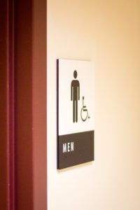 Men's bathrooms remain menstrual product-free. Photo by Hung Vuong.