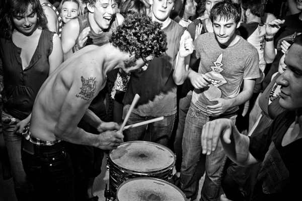 Part of the casual and highly interactive ethos of Friday’s Royal Bangs show included placing the drumset in the midst of the crowd.     Lawrence Sumulong/The Scarlet and Black