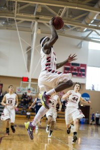 Kyle Parker ’17 makes a breakaway layup after a steal in the first half against Lawrence University on Saturday, Feb. 22. Photograph by John Brady. 