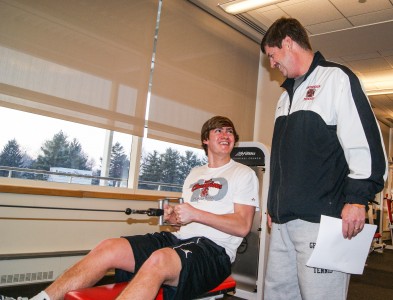 Will ’17 and Andy Hamilton ’85 enjoy a workout session on Wednesday, Feb. 12. Photograph by Joe Wlos. 