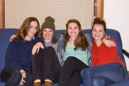 Clara Kirkpatrick, Annie Leverich, Chloe Yates and Sami Rebein (all ’14) in a warm embrace. Photo by Tela Ebersole.