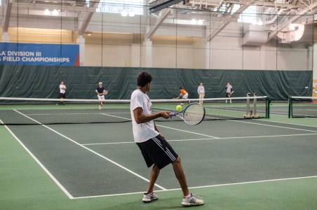 Caleb Kumar ’16 practices a rally on Wednesday, April 2. Photo by Shadman Asif.